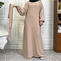BelleNoor beige long sleeve maxi abaya dress with balloon sleeves and elasticated cuffs in a modest flowing fit