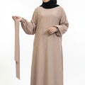 BelleNoor beige maxi abaya dress with long balloon sleeves and elasticated cuffs, worn with a black hijab
