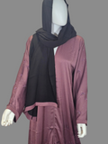 BelleNoor dusty mauve abaya with beaded floral embroidery on sleeves and front, paired with a black hijab.