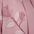 BelleNoor dusty pink open abaya featuring a delicate floral print on lightweight, flowy fabric