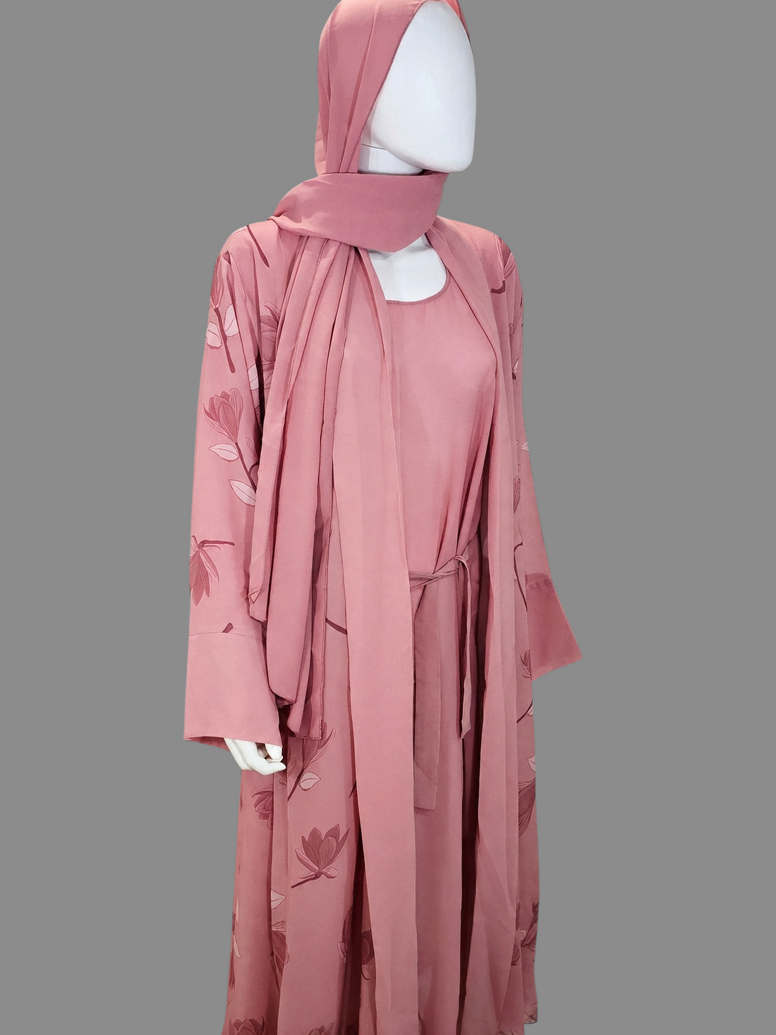 BelleNoor dusty pink floral print open abaya set with matching inner dress and hijab on a mannequin