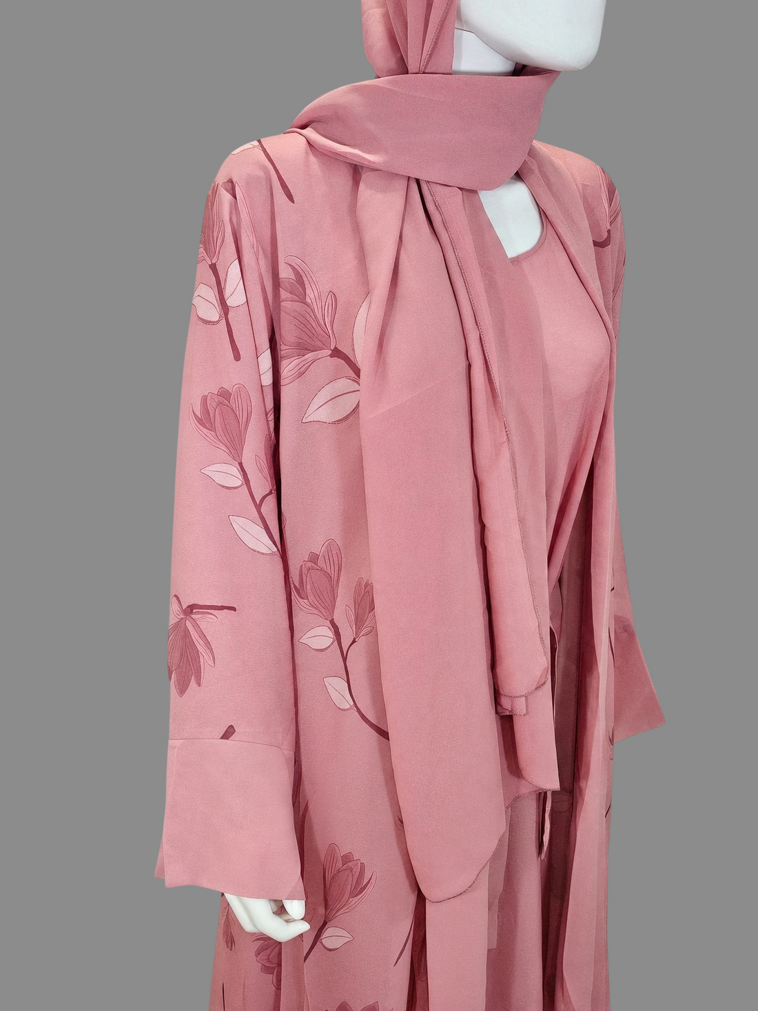BelleNoor dusty pink floral print open abaya set with matching inner dress and hijab on a mannequin