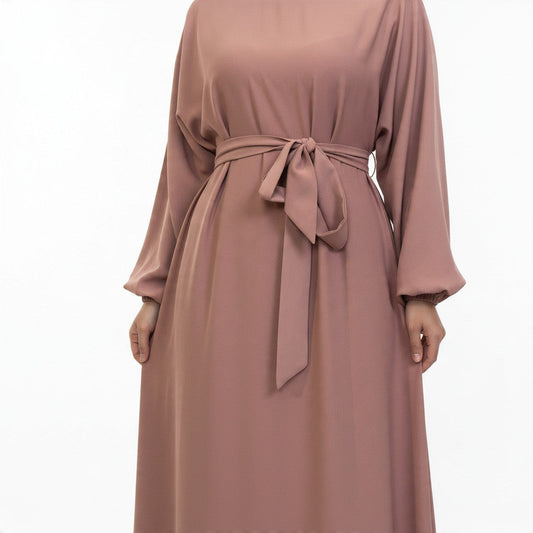 BelleNoor dusty rose abaya in breathable Nida fabric with a tie-waist belt and long cuffed sleeves