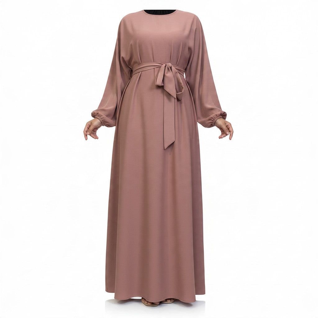 BelleNoor dusty rose abaya in breathable Nida fabric with a tie-waist and long sleeves for elegant everyday wear.