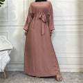BelleNoor dusty rose Nida abaya with long sleeves and a matching tie-waist belt for an elegant, modest look.