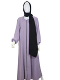 BelleNoor lavender abaya with front zipper and elasticated cuffs, paired with a black chiffon hijab on a mannequin