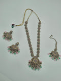 BelleNoor long Kundan necklace set with Meenakari pink and mint green floral motifs, pearl accents, and matching earrings