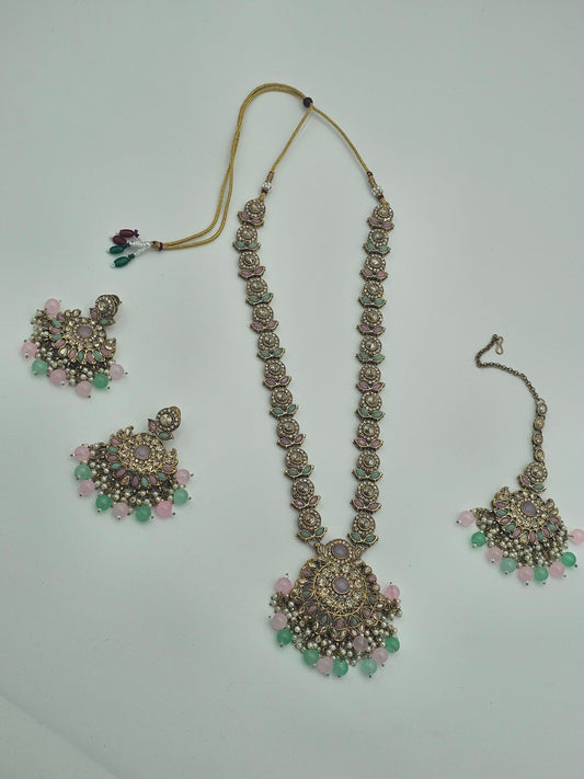 BelleNoor long Kundan necklace set with Meenakari pink and mint green floral motifs, pearl accents, and matching earrings