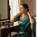 BelleNoor royal purple Kundan necklace set with chandelier earrings and maang tikka worn by a woman in a green saree