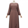 BelleNoor purple Nida abaya with long sleeves and a matching tie waist belt on a mannequin